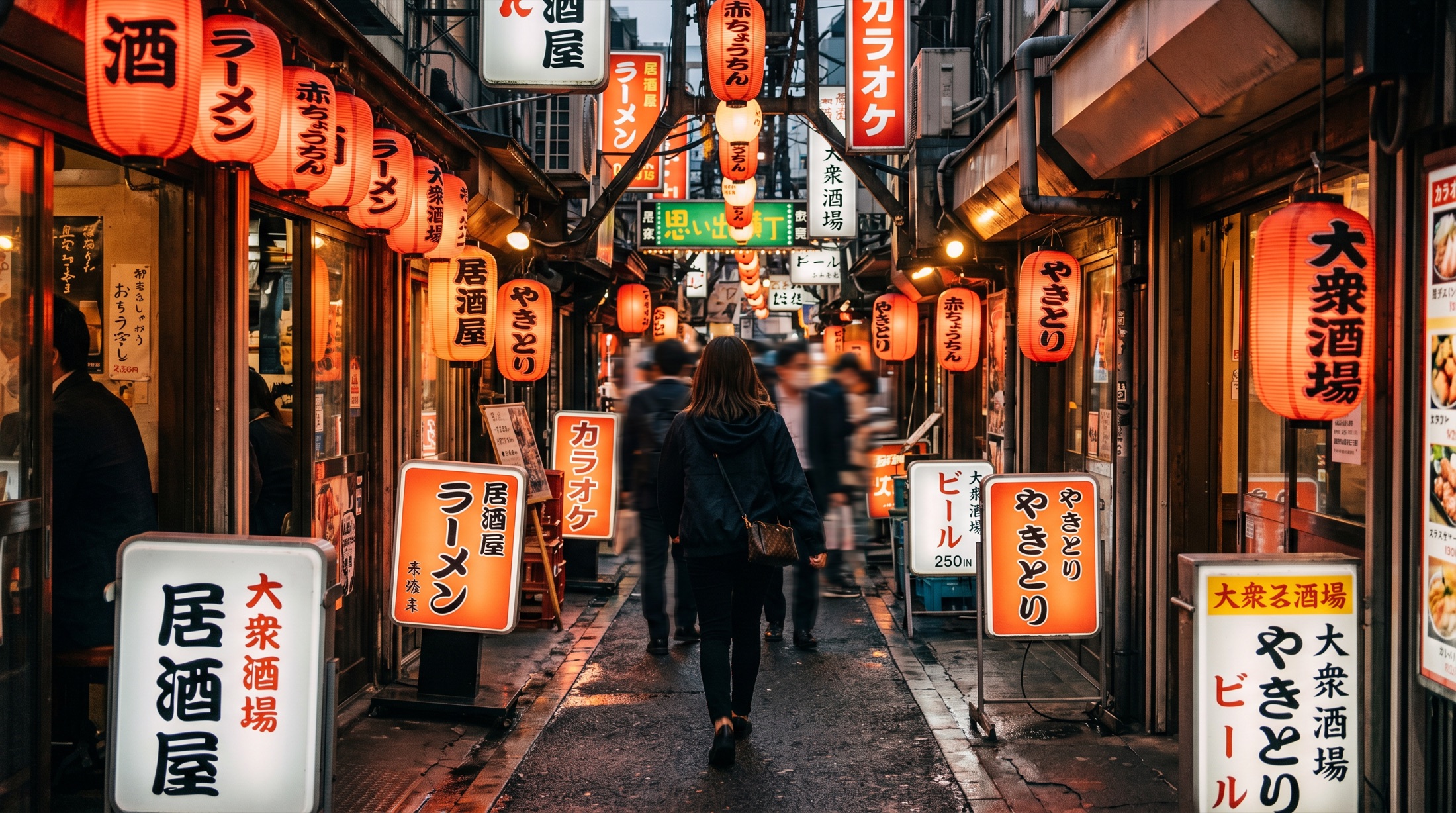 A neon-lit alley in Tokyo at dusk